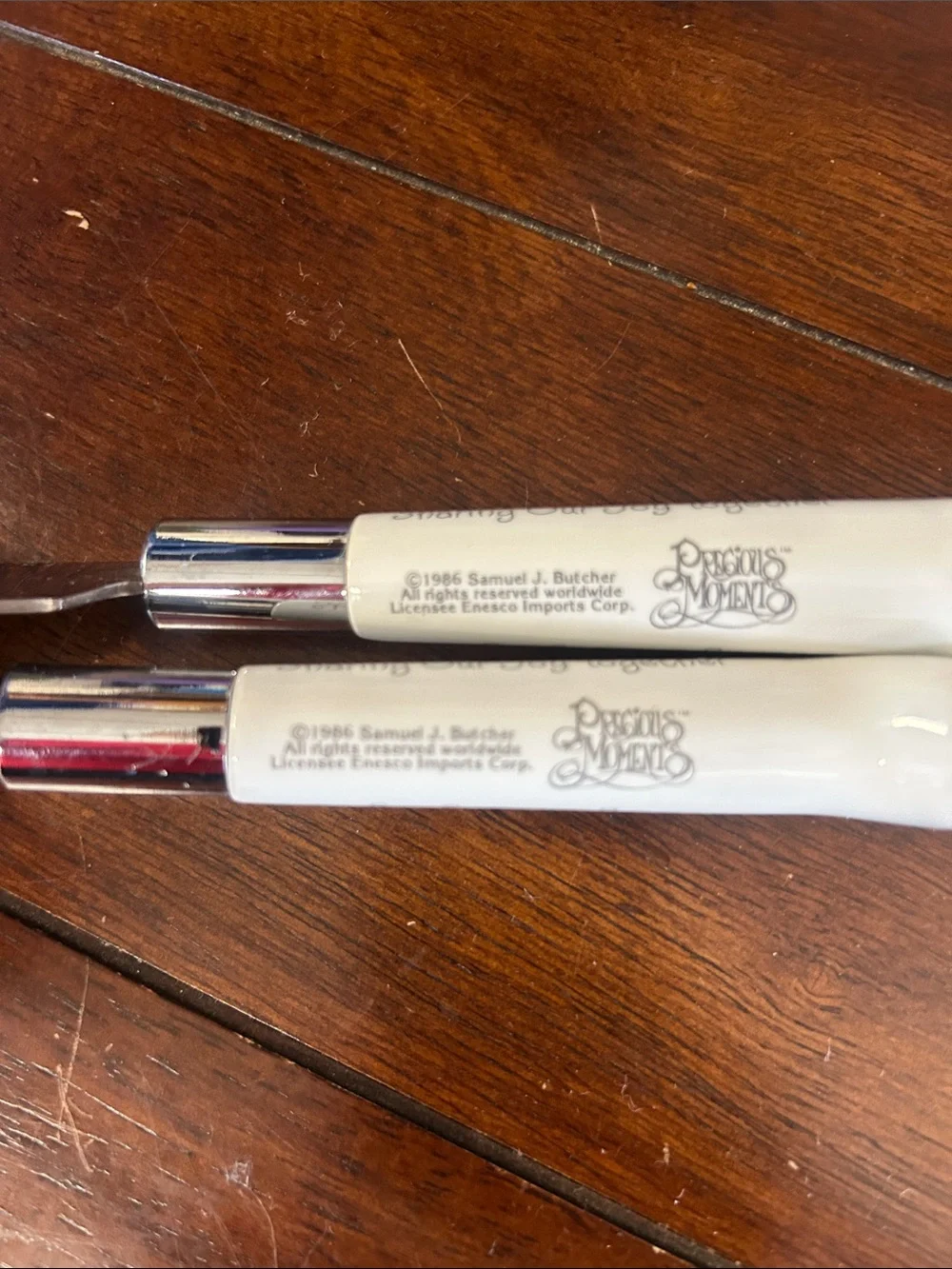 Precious Moments White Handle Cake Server and Serrated Knife Duo